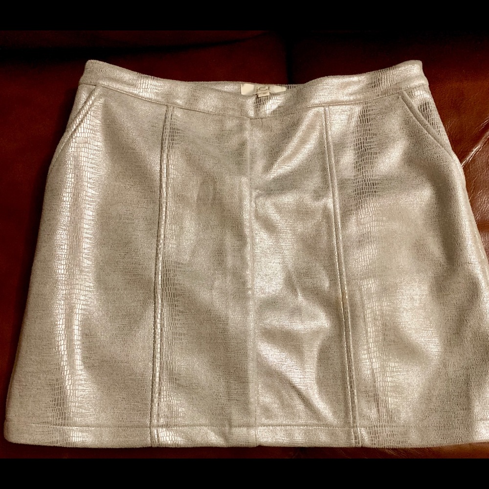 Silver skirt- mid length in medium